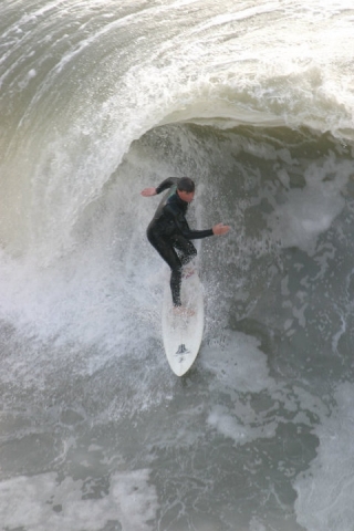 Surfe montando olas